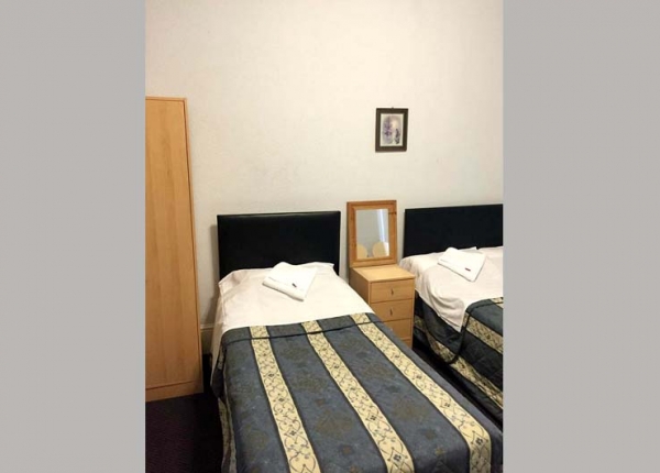 Twin room at Anwar House Hotel